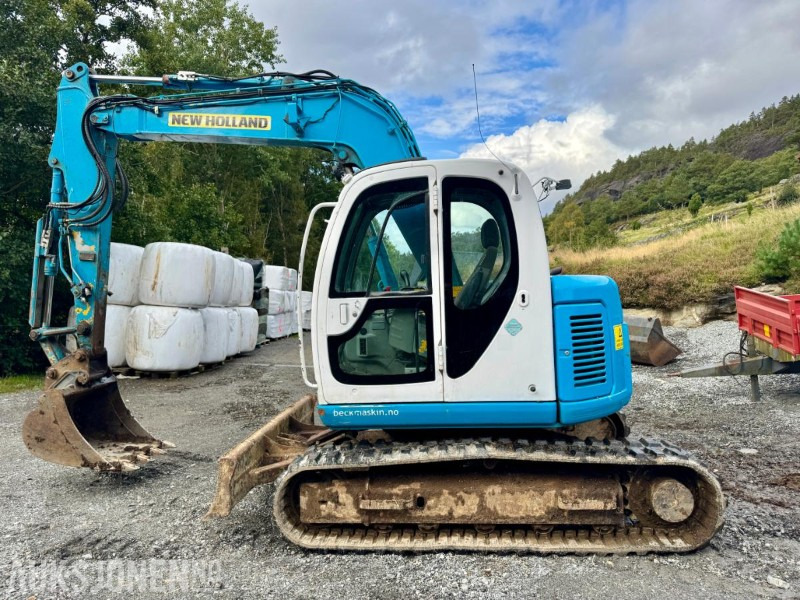 2008 New Holland E70SR-ES Gravemaskin - Tannskuffe - Grøfteskuffe - Pusseskuffe - Timer: 5746 - حفارة مُصَّغرة: صورة 5 2008 New Holland E70SR-ES Gravemaskin - Tannskuffe - Grøfteskuffe - Pusseskuffe - Timer: 5746 - حفارة مُصَّغرة: صورة 5