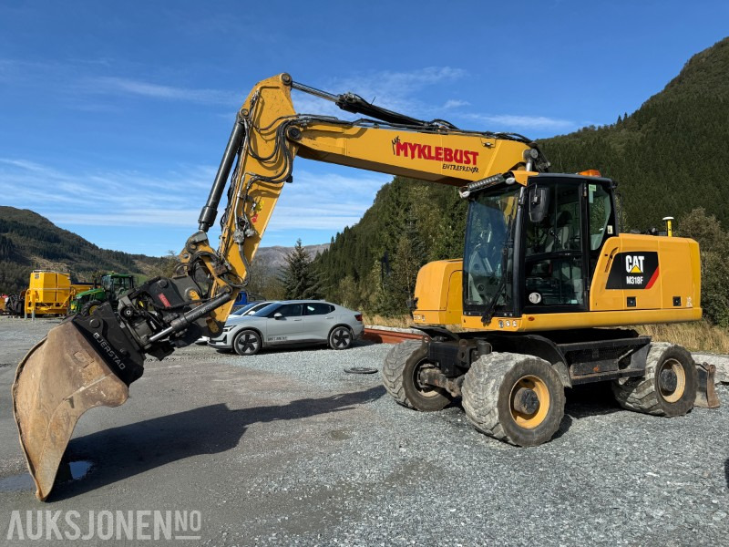 2018 Velholdt Cat M318F Hjulgraver med OilQuick Rotortilt, 9577 timer - حفارة: صورة 1 2018 Velholdt Cat M318F Hjulgraver med OilQuick Rotortilt, 9577 timer - حفارة: صورة 1