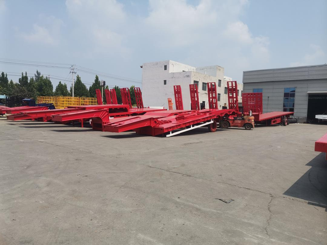 ZHICHENG Semni Flat Bed Low Bed Floater with 3 Axles 4 Axles New or Used 12M 13.75M In High Quality - عربة منخفضة مسطحة نصف مقطورة: صورة 3 ZHICHENG Semni Flat Bed Low Bed Floater with 3 Axles 4 Axles New or Used 12M 13.75M In High Quality - عربة منخفضة مسطحة نصف مقطورة: صورة 3