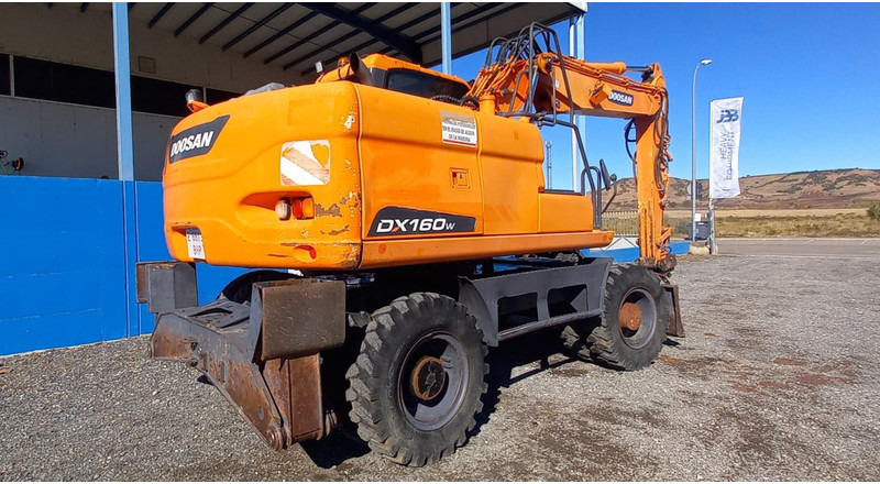 Doosan DX140W-3 - حفارة دولاب: صورة 4 Doosan DX140W-3 - حفارة دولاب: صورة 4