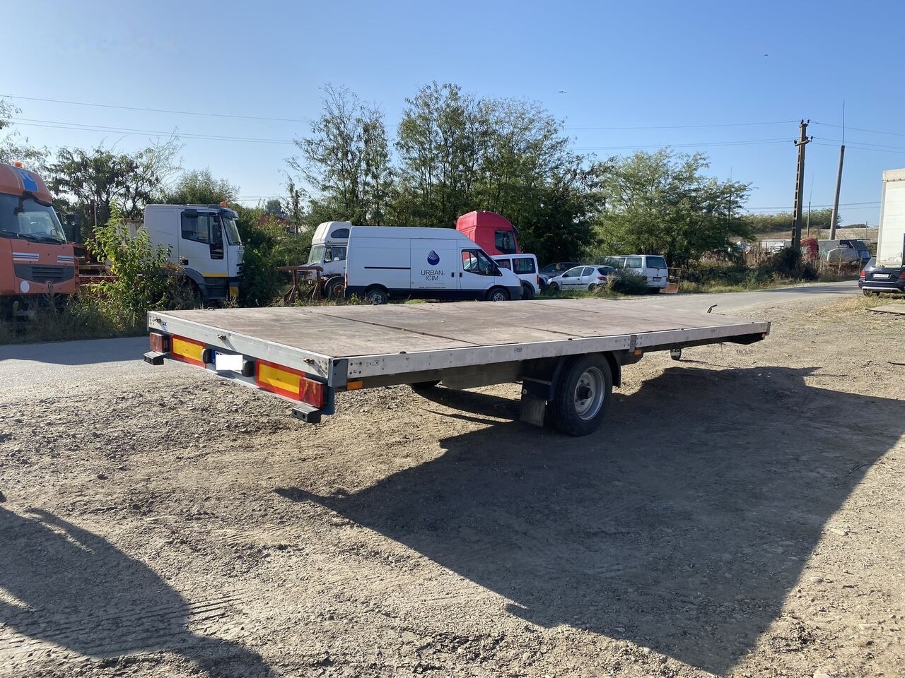 Schmitz Cargobull REPACOM Rema remorca 6,5 m lungime platforma pentru marfa / util - مقطورات مسطحة: صورة 1 Schmitz Cargobull REPACOM Rema remorca 6,5 m lungime platforma pentru marfa / util - مقطورات مسطحة: صورة 1