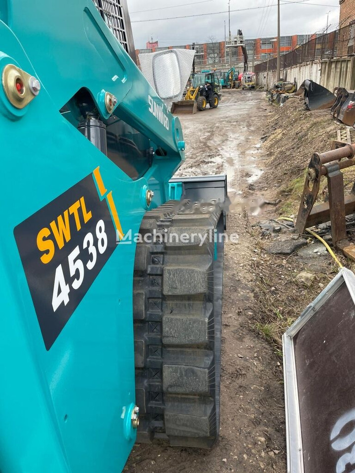 Sunward SWL 4538 - اللودر المجنزر صغير: صورة 3 Sunward SWL 4538 - اللودر المجنزر صغير: صورة 3
