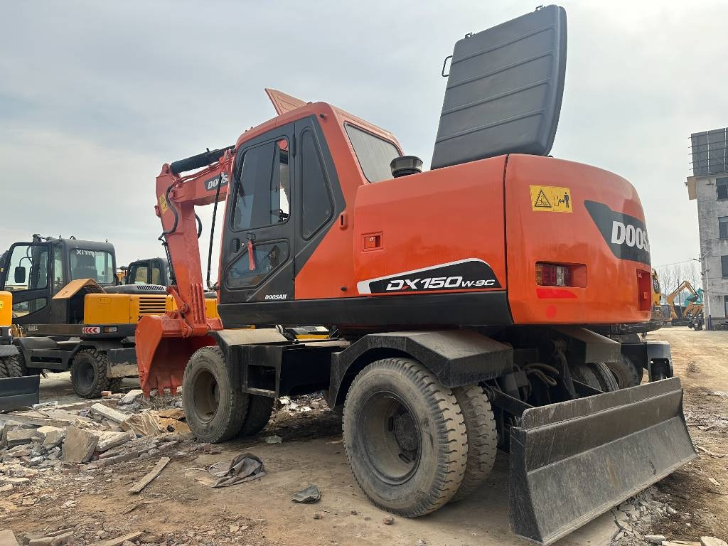 Doosan DH 150 W-7 - حفارة دولاب: صورة 1 Doosan DH 150 W-7 - حفارة دولاب: صورة 1