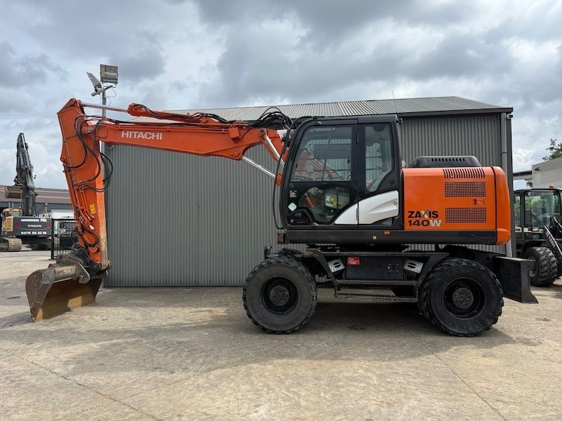 Hitachi ZX 140 W-5 - حفارة دولاب: صورة 1 Hitachi ZX 140 W-5 - حفارة دولاب: صورة 1