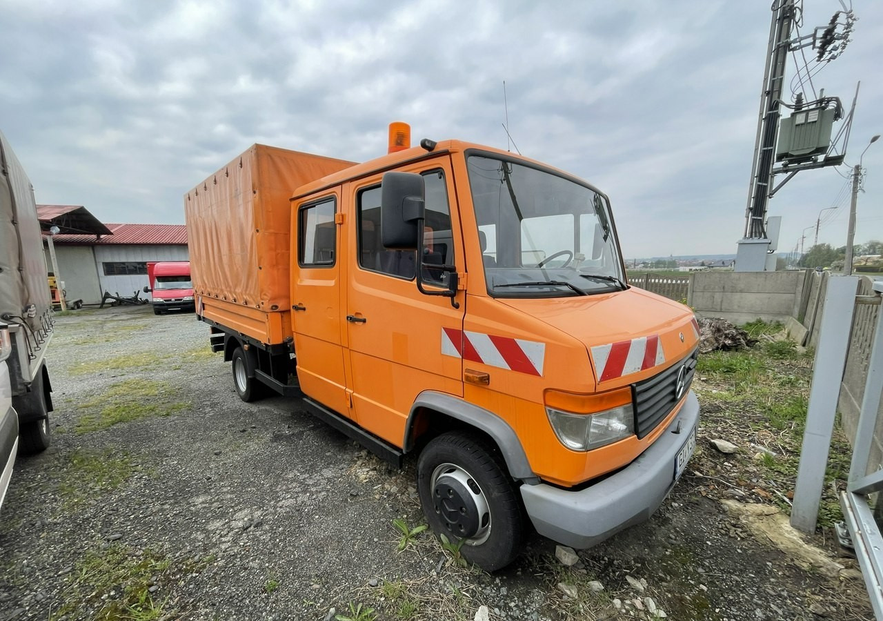 Mercedes-Benz Inny Mercedes-Benz Vario 614 Brygadówka skrzynia plandeka 6-oso doka dokka 2004 - شاحنة ستارة: صورة 1 Mercedes-Benz Inny Mercedes-Benz Vario 614 Brygadówka skrzynia plandeka 6-oso doka dokka 2004 - شاحنة ستارة: صورة 1