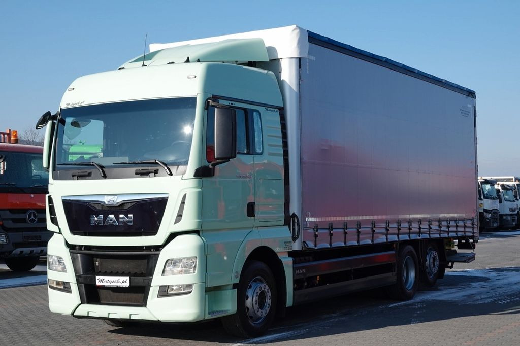 MAN TGX 26.440 / 6x2 / FIRANKA - 8,15 m / SOLÓWKA / - شاحنة ستارة: صورة 1 MAN TGX 26.440 / 6x2 / FIRANKA - 8,15 m / SOLÓWKA / - شاحنة ستارة: صورة 1