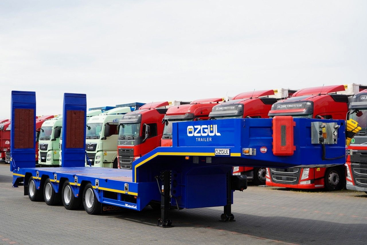 OZGUL NACZEPA LAWETA / LW4 / NISKOPODWOZIOWA - عربة منخفضة مسطحة نصف مقطورة: صورة 1 OZGUL NACZEPA LAWETA / LW4 / NISKOPODWOZIOWA - عربة منخفضة مسطحة نصف مقطورة: صورة 1