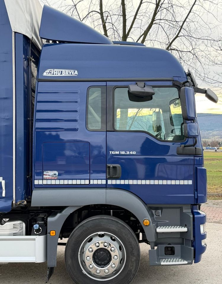 شاحنة ستارة MAN TGM 18.340 / FIRANKA / LIFT / SPROWADZONY / KLIMA POSTOJOWA / 2017 / 9700 ŁADOWNOŚĆ / AUTOMAT / 18 PALET / E6 / WINDA /: صورة 13 شاحنة ستارة MAN TGM 18.340 / FIRANKA / LIFT / SPROWADZONY / KLIMA POSTOJOWA / 2017 / 9700 ŁADOWNOŚĆ / AUTOMAT / 18 PALET / E6 / WINDA /: صورة 13