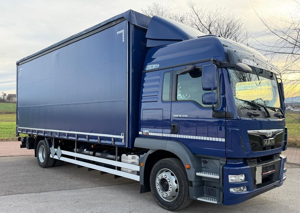 MAN TGM 18.340 / FIRANKA / SPROWADZONY / 9100 ŁADOWNOŚĆ / 18 PALET / E6 / WINDA / - شاحنة ستارة: صورة 1 MAN TGM 18.340 / FIRANKA / SPROWADZONY / 9100 ŁADOWNOŚĆ / 18 PALET / E6 / WINDA / - شاحنة ستارة: صورة 1