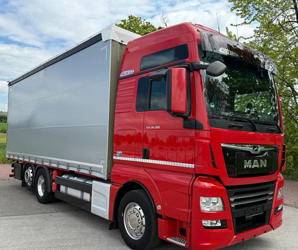 MAN TGX 26.500/LIFT/6X2/KLIMA POSTOJOWA/18PALET/E6/FIRANKA/WINDA/NISKI PRZEBIEG/JEDEN WŁAŚCICIEL/PODWIESZANA OŚ - شاحنة ستارة: صورة 1 MAN TGX 26.500/LIFT/6X2/KLIMA POSTOJOWA/18PALET/E6/FIRANKA/WINDA/NISKI PRZEBIEG/JEDEN WŁAŚCICIEL/PODWIESZANA OŚ - شاحنة ستارة: صورة 1