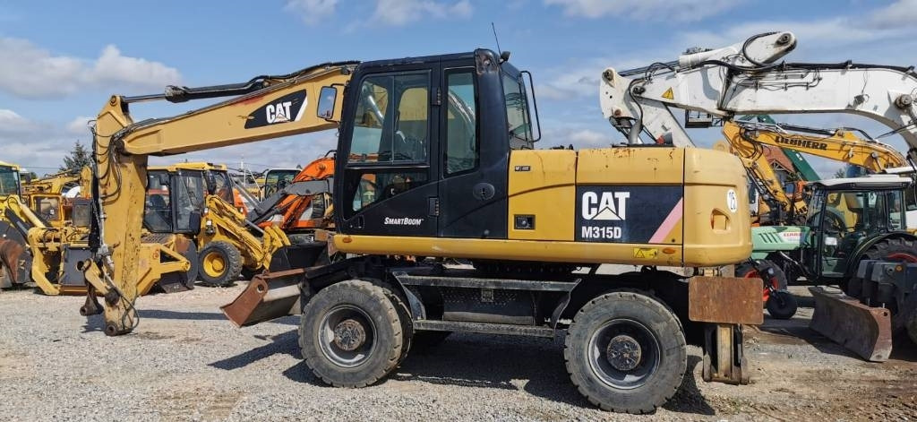 CAT M 315 D - حفارة دولاب: صورة 4 CAT M 315 D - حفارة دولاب: صورة 4
