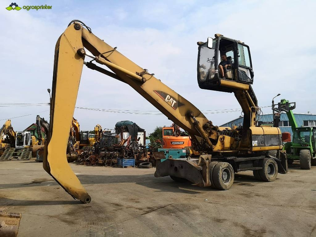 CAT M 322 C MH  - معالج النفايات: صورة 1 CAT M 322 C MH  - معالج النفايات: صورة 1