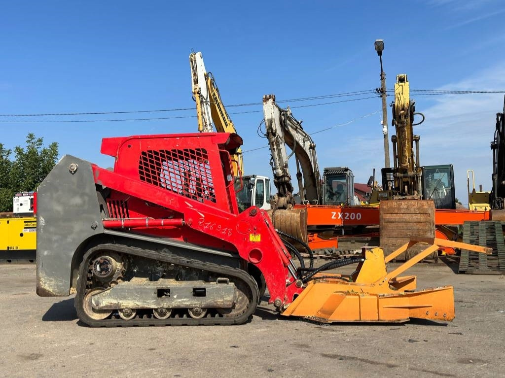 Gehl RT 175+Landhonor Forestry Mulcher - اللودر المجنزر صغير: صورة 4 Gehl RT 175+Landhonor Forestry Mulcher - اللودر المجنزر صغير: صورة 4
