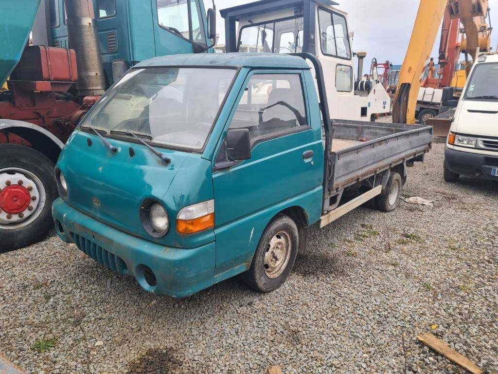 Hyundai H 100 - شاحنات مسطحة: صورة 1 Hyundai H 100 - شاحنات مسطحة: صورة 1