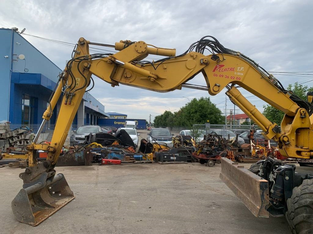 Komatsu PW118MR-11W - حفارة دولاب: صورة 3 Komatsu PW118MR-11W - حفارة دولاب: صورة 3