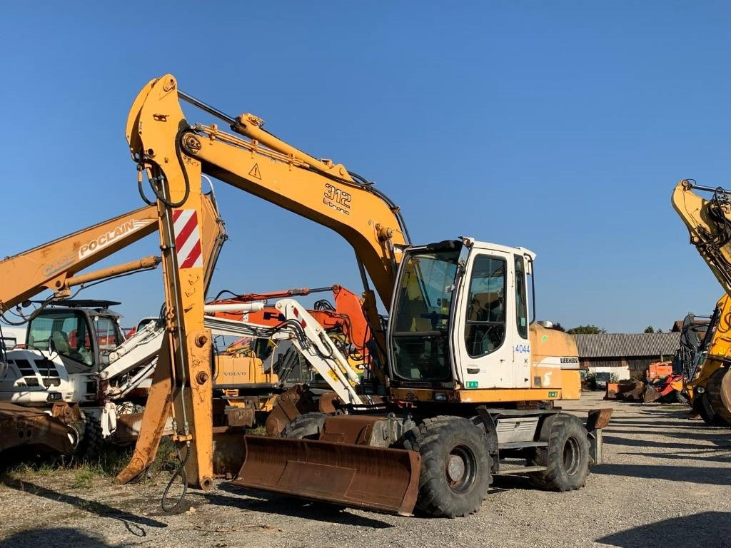 Liebherr A 312  - حفارة دولاب: صورة 1 Liebherr A 312  - حفارة دولاب: صورة 1