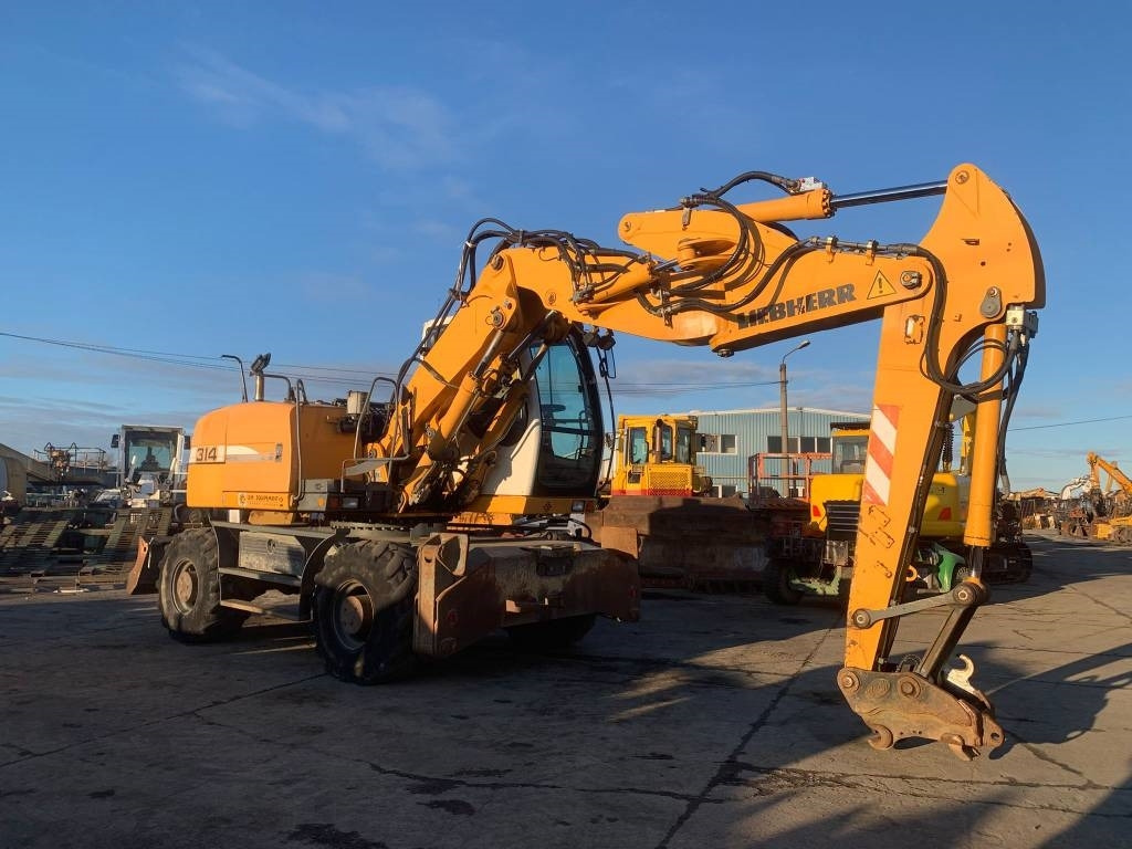 Liebherr A 314 Litronic - حفارة دولاب: صورة 5 Liebherr A 314 Litronic - حفارة دولاب: صورة 5
