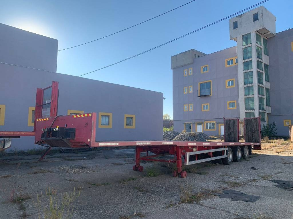 Montracon 3 Axles - عربة منخفضة مسطحة نصف مقطورة: صورة 1 Montracon 3 Axles - عربة منخفضة مسطحة نصف مقطورة: صورة 1