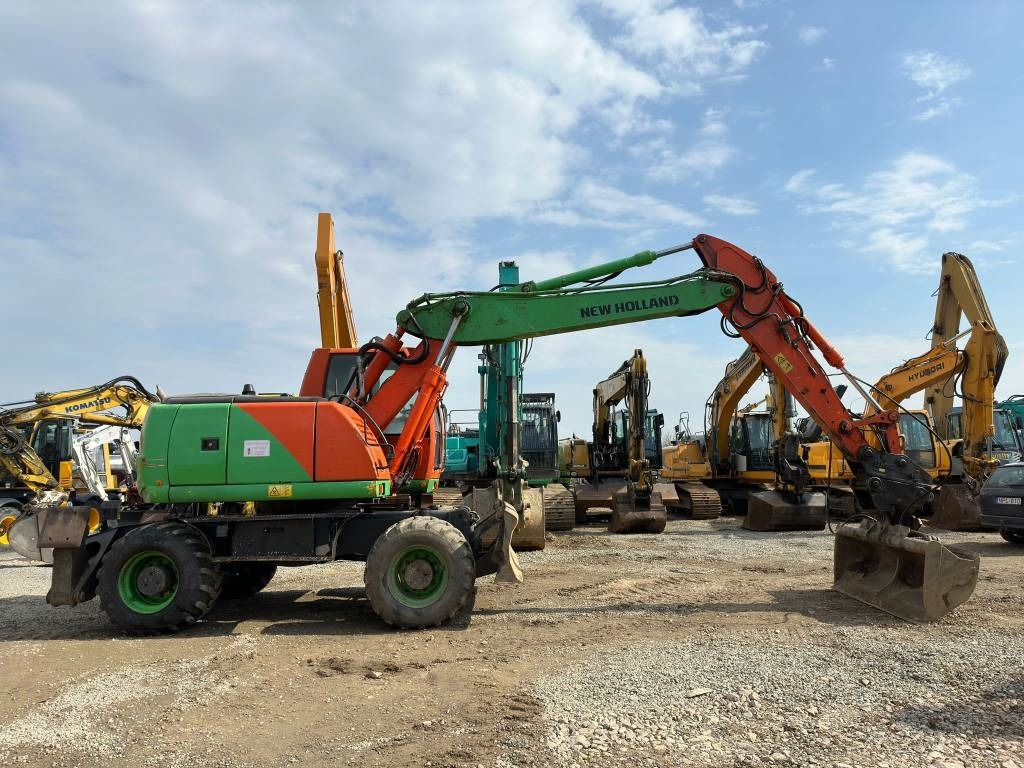 New Holland MH Plus - حفارة دولاب: صورة 2 New Holland MH Plus - حفارة دولاب: صورة 2