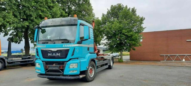 MAN TGS 18.440 Abroller mit Funk +Kran vor - شاحنة ذات خطاف, شاحنة كرين: صورة 1 MAN TGS 18.440 Abroller mit Funk +Kran vor - شاحنة ذات خطاف, شاحنة كرين: صورة 1