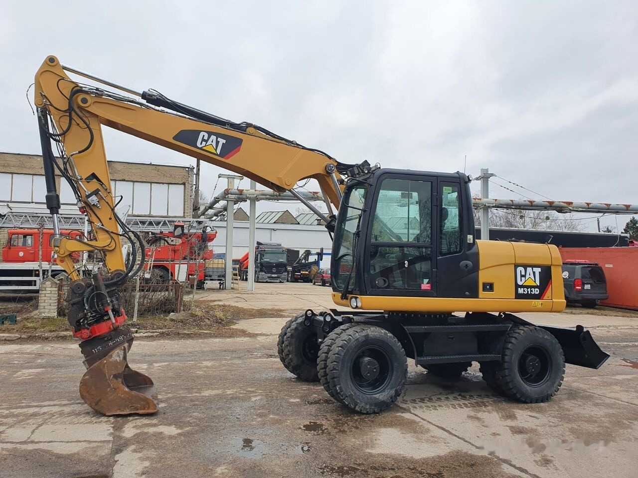 Caterpillar M 313 D Tiltrotator - حفارة دولاب: صورة 2 Caterpillar M 313 D Tiltrotator - حفارة دولاب: صورة 2