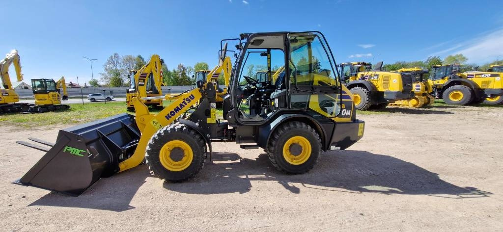 Komatsu WA 70 - اللودر بعجل: صورة 1 Komatsu WA 70 - اللودر بعجل: صورة 1