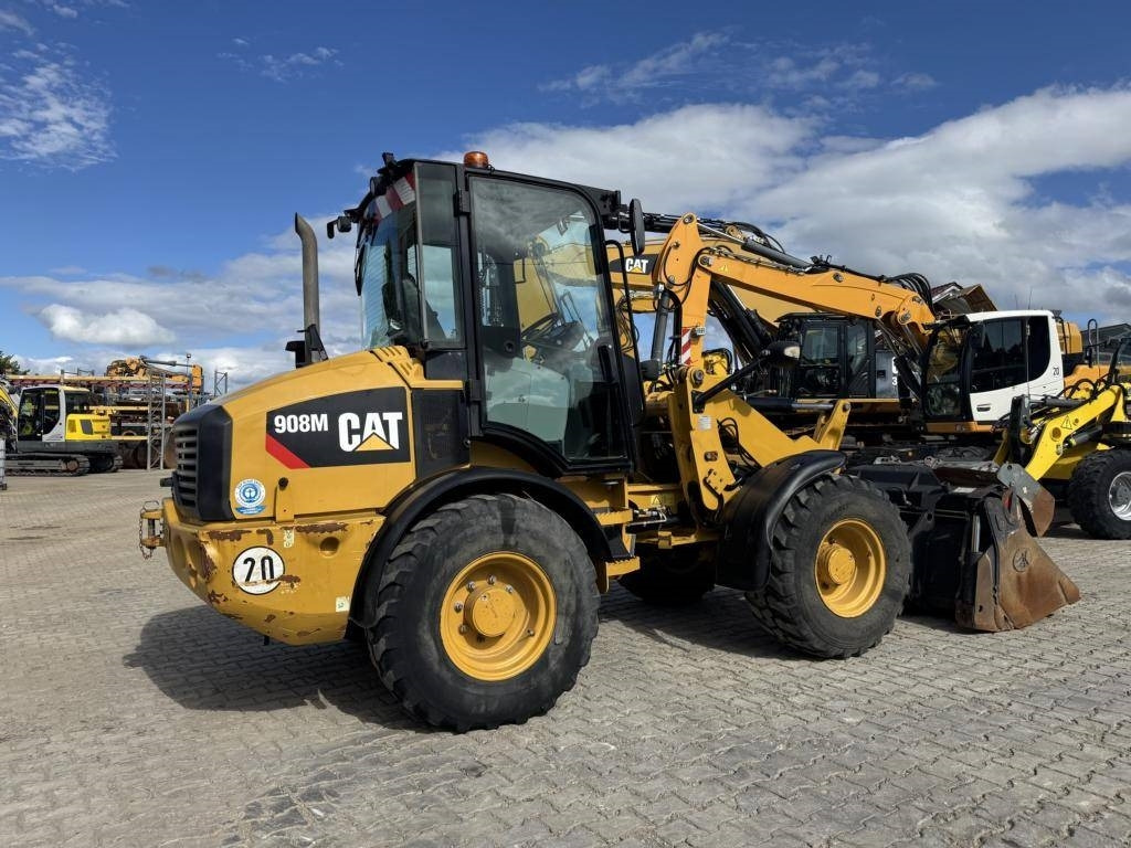 CAT 908M mit Klappschaufe und Palletengabeln - اللودر بعجل: صورة 4 CAT 908M mit Klappschaufe und Palletengabeln - اللودر بعجل: صورة 4