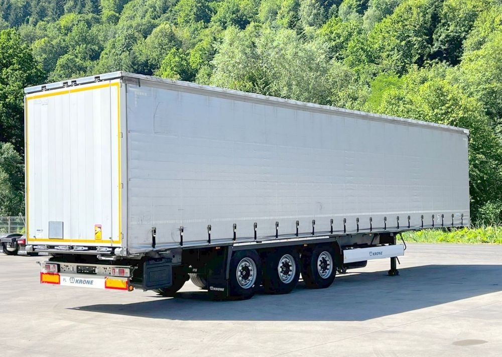 Krone Firanka Coilmulde // 9m // Alu Drzwi // Ażury // Oś podnoszona // - نصف مقطورة ستارة: صورة 1 Krone Firanka Coilmulde // 9m // Alu Drzwi // Ażury // Oś podnoszona // - نصف مقطورة ستارة: صورة 1