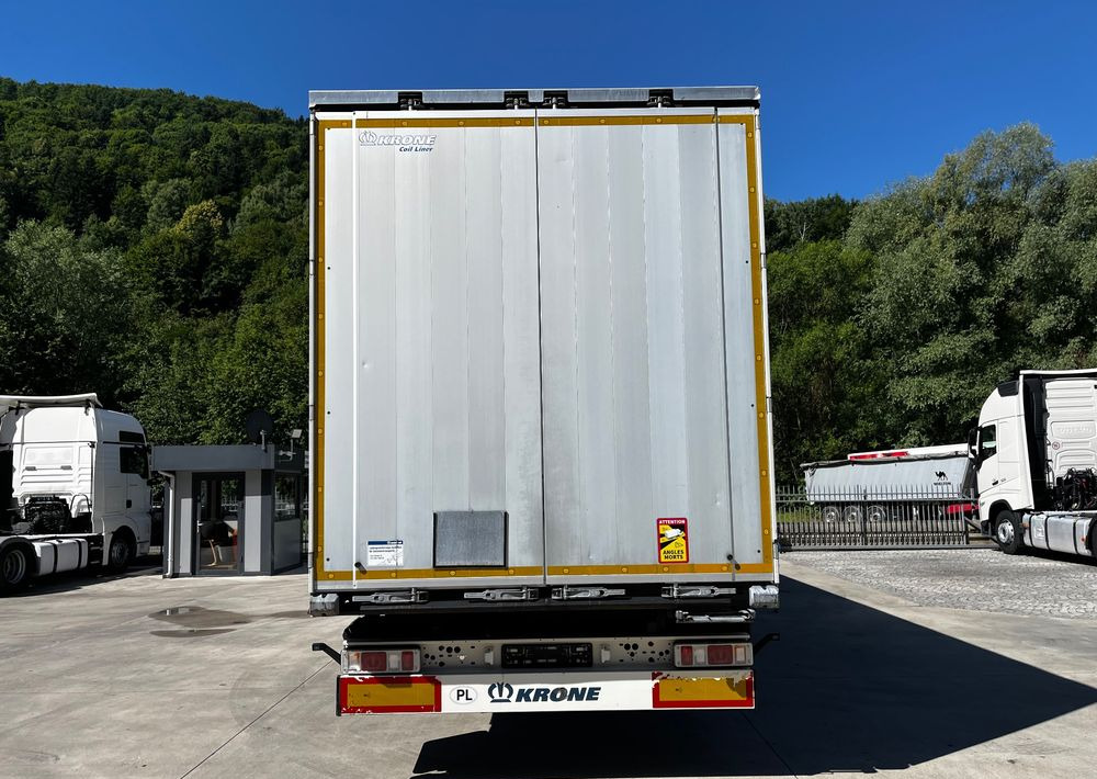 Krone Firanka Coilmulde // 9m // Alu Drzwi // Ażury // Oś podnoszona // - نصف مقطورة ستارة: صورة 2 Krone Firanka Coilmulde // 9m // Alu Drzwi // Ażury // Oś podnoszona // - نصف مقطورة ستارة: صورة 2