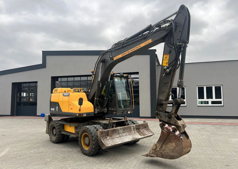 Volvo EW140D - حفارة دولاب: صورة 1 Volvo EW140D - حفارة دولاب: صورة 1