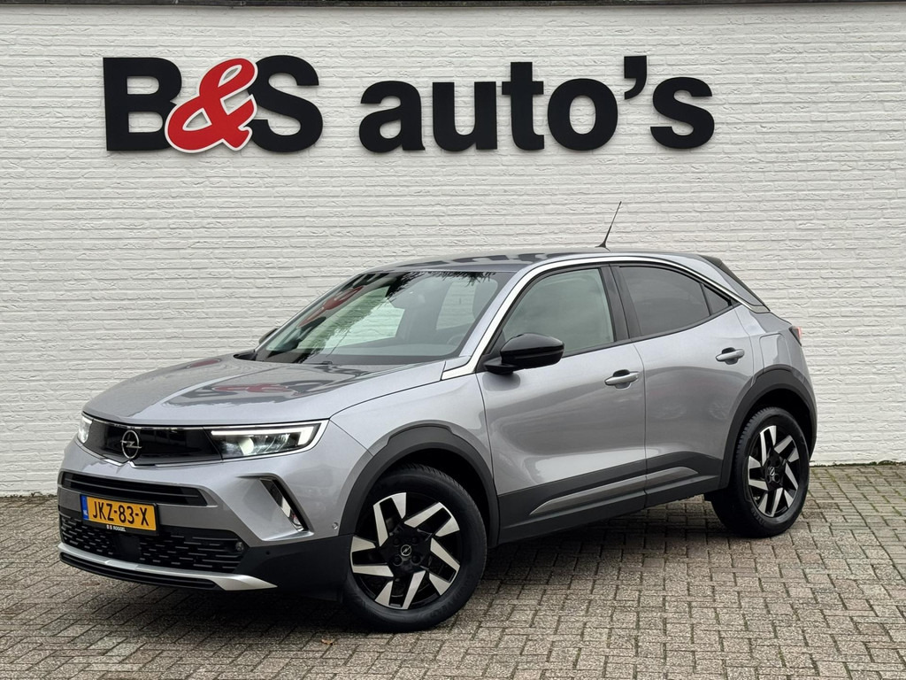 Opel Mokka-1.2 Turbo Elegance Cruise control Climate control Stoel- stuurverwarming Apple / Android Parkeersensoren plus camera - سيارة دفع رباعي: صورة 1 Opel Mokka-1.2 Turbo Elegance Cruise control Climate control Stoel- stuurverwarming Apple / Android Parkeersensoren plus camera - سيارة دفع رباعي: صورة 1