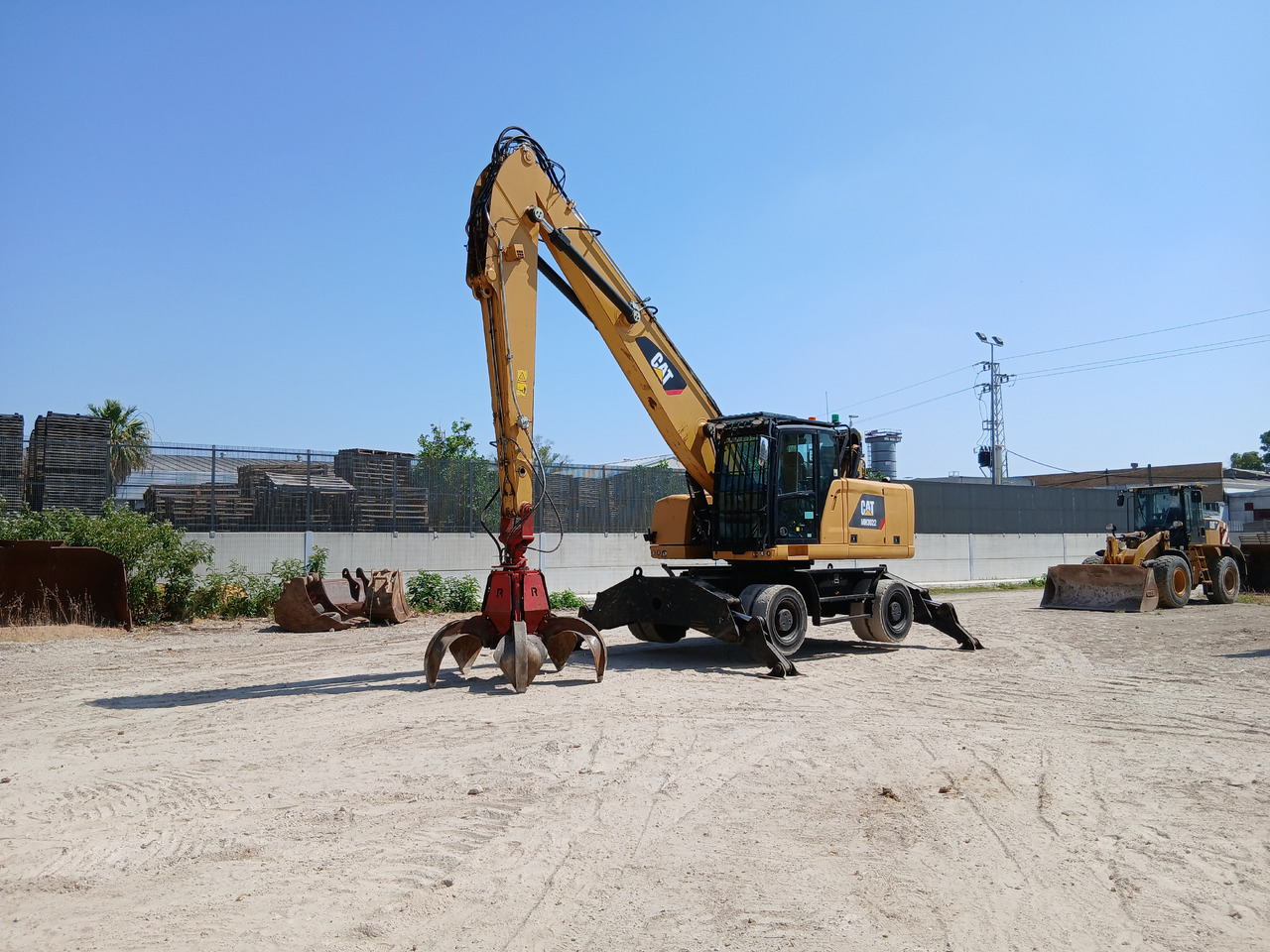 Caterpillar MH3022 - آلات البناء: صورة 1 Caterpillar MH3022 - آلات البناء: صورة 1