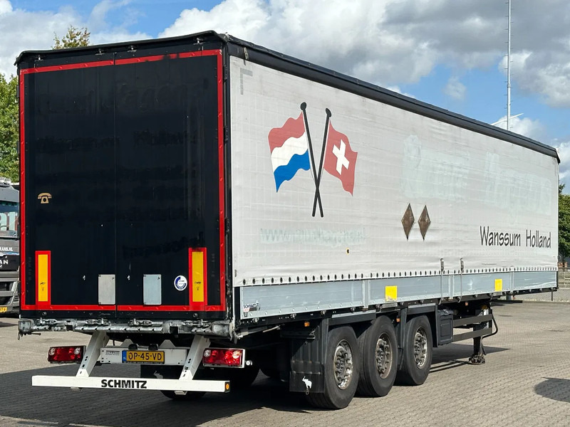 Schmitz Cargobull Schuifzeil met Borden / Disc-Brakes / Huckepack / Code XL / Apk - نصف مقطورة ستارة: صورة 1 Schmitz Cargobull Schuifzeil met Borden / Disc-Brakes / Huckepack / Code XL / Apk - نصف مقطورة ستارة: صورة 1