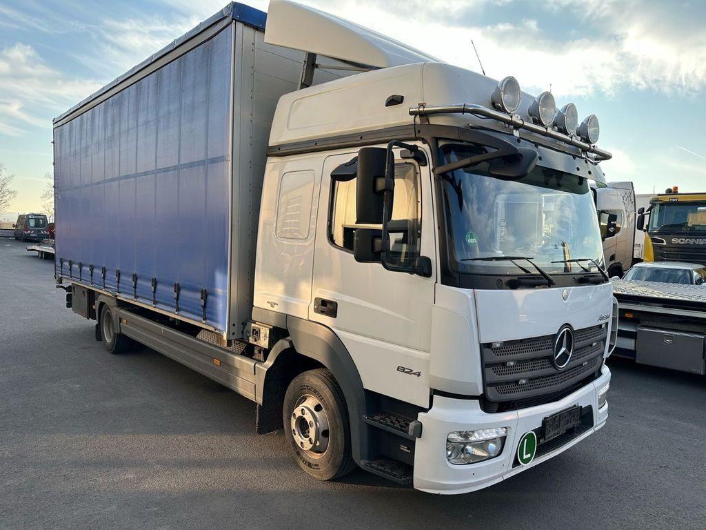Mercedes-Benz Atego 824 Top-Ausstattung*Pritsche-Plane*Top* Mercedes-Benz Atego 824 Top-Ausstattung*Pritsche-Plane*Top* - شاحنة ستارة جانبية: صورة 1 Mercedes-Benz Atego 824 Top-Ausstattung*Pritsche-Plane*Top* Mercedes-Benz Atego 824 Top-Ausstattung*Pritsche-Plane*Top* - شاحنة ستارة جانبية: صورة 1