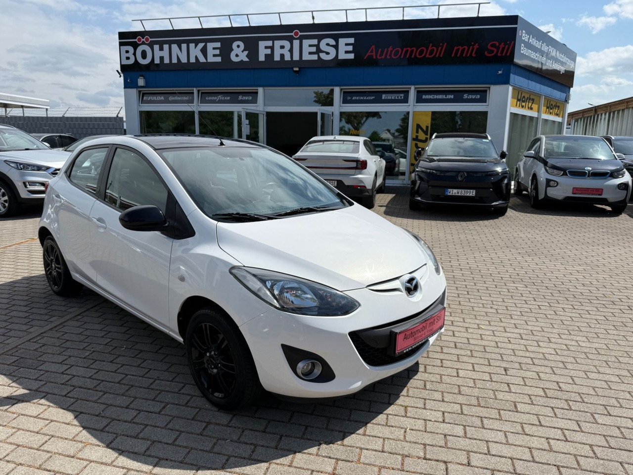 Mazda 2 Lim. 1.3 Origami 5 TÜER KLIMA SHZ TÜV NEU - سيارة: صورة 1 Mazda 2 Lim. 1.3 Origami 5 TÜER KLIMA SHZ TÜV NEU - سيارة: صورة 1