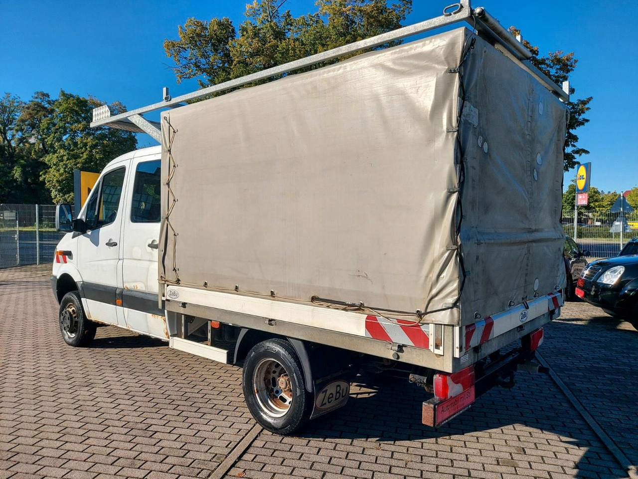 Mercedes-Benz Sprinter II Pritsche DoKa 516 4X4 Plane 6 Sitze - شاحنة ستارة جانبية, الشاحنات الصغيرة كابينة مزدوجة: صورة 4 Mercedes-Benz Sprinter II Pritsche DoKa 516 4X4 Plane 6 Sitze - شاحنة ستارة جانبية, الشاحنات الصغيرة كابينة مزدوجة: صورة 4