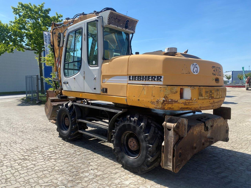 Liebherr A316 Litronic NVT - حفارة دولاب: صورة 1 Liebherr A316 Litronic NVT - حفارة دولاب: صورة 1