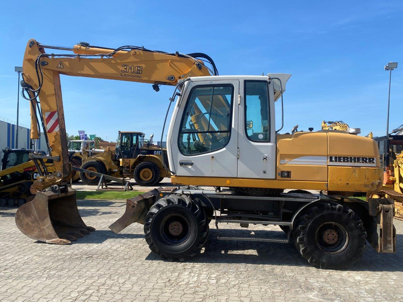 Liebherr A316 Litronic NVT - حفارة دولاب: صورة 2 Liebherr A316 Litronic NVT - حفارة دولاب: صورة 2