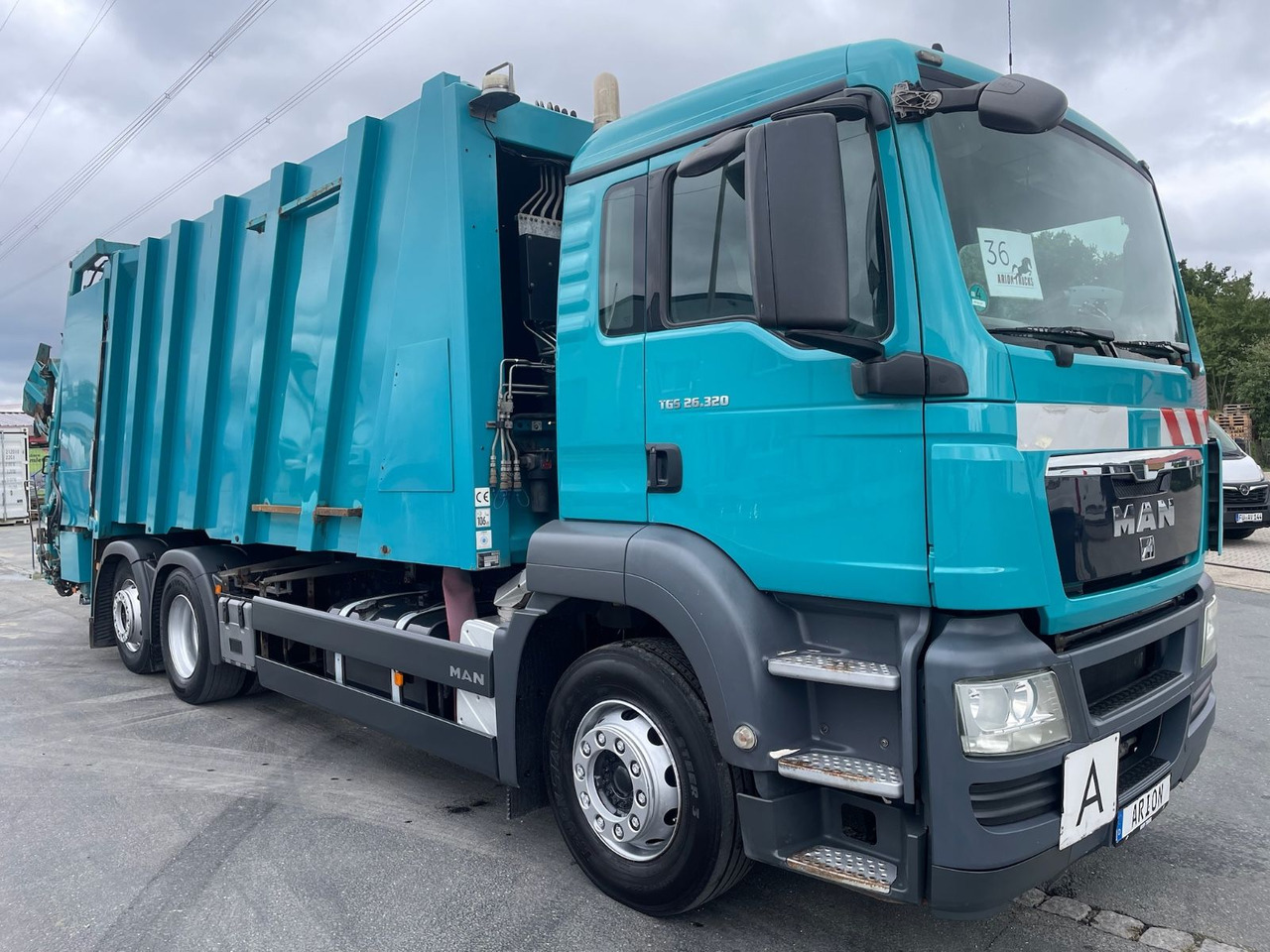 MAN TGS 26.320 6x2-2 BL Müllwagen/FAUN/DIGI-SENS/EU5 - شاحنة النفايات: صورة 1 MAN TGS 26.320 6x2-2 BL Müllwagen/FAUN/DIGI-SENS/EU5 - شاحنة النفايات: صورة 1