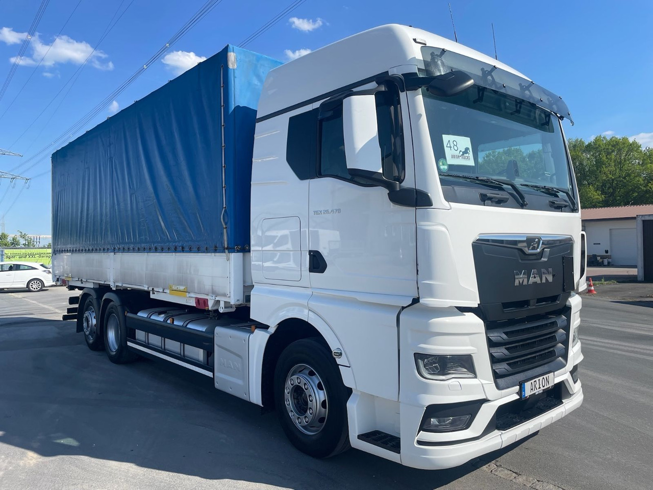 MAN TGX 26.470 6x2-4 LL Pritsche+Plane/BDF/NLA/EU6d - شاحنة ستارة: صورة 1 MAN TGX 26.470 6x2-4 LL Pritsche+Plane/BDF/NLA/EU6d - شاحنة ستارة: صورة 1