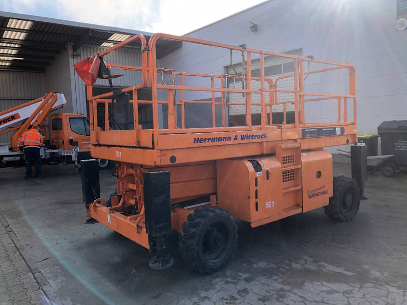 Haulotte H 12 SX - رافعة هيدروليكية مقصية: صورة 1 Haulotte H 12 SX - رافعة هيدروليكية مقصية: صورة 1