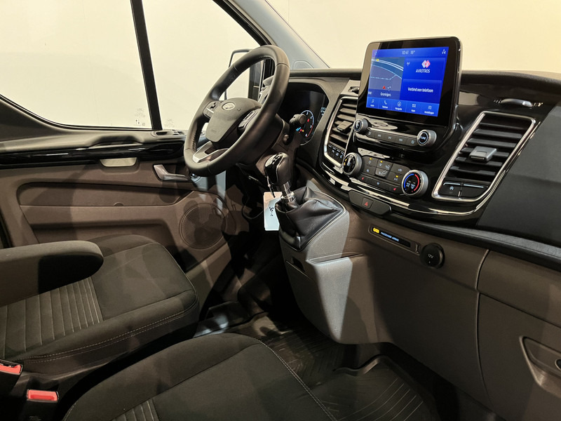 Ford Transit Custom 2.0 TDCI L2H1 Limited 130 PK / Euro 6 / Airco / Cruise Control / CarPlay / PDC / Navigatie / 3-Zits / 16.200 KM !! / BPM VRIJ !! - فان المدمجة: صورة 3 Ford Transit Custom 2.0 TDCI L2H1 Limited 130 PK / Euro 6 / Airco / Cruise Control / CarPlay / PDC / Navigatie / 3-Zits / 16.200 KM !! / BPM VRIJ !! - فان المدمجة: صورة 3