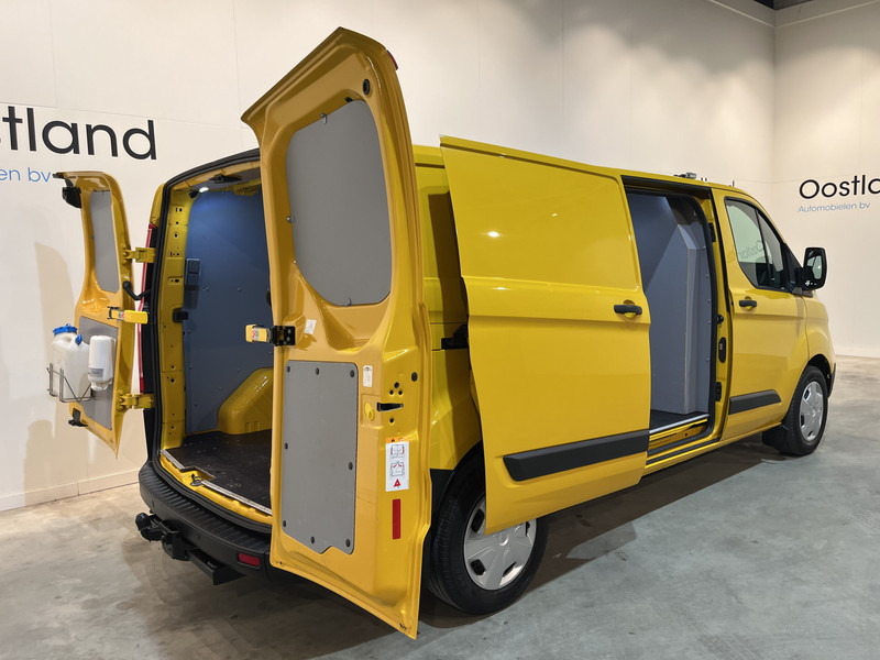 Ford Transit Custom 340 2.0 TDCI L2H1 Trend 130 PK / Euro 6 / Airco / Cruise Control / PDC / Trekhaak - فان المدمجة: صورة 4 Ford Transit Custom 340 2.0 TDCI L2H1 Trend 130 PK / Euro 6 / Airco / Cruise Control / PDC / Trekhaak - فان المدمجة: صورة 4
