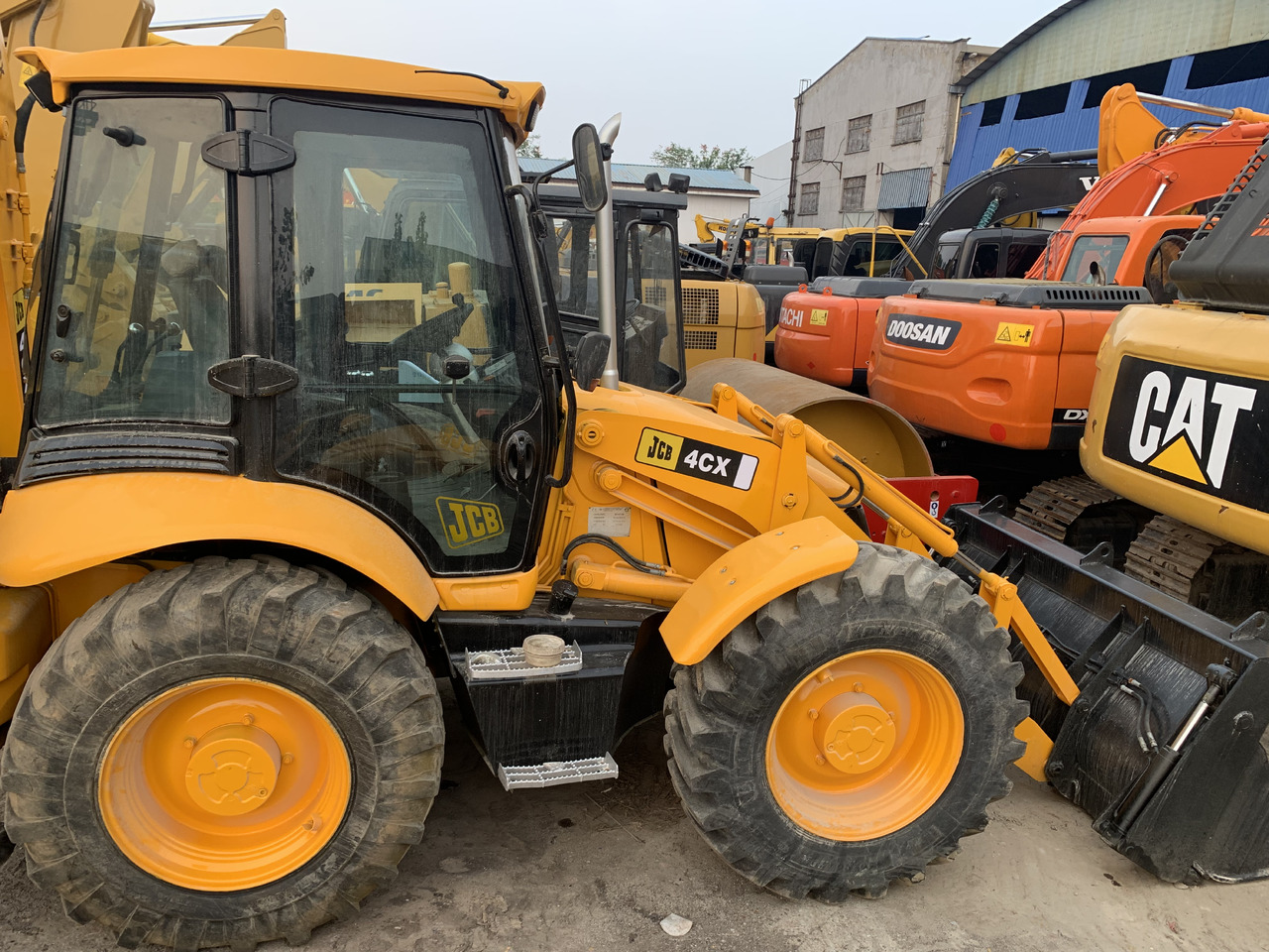 JCB 4CX - اللودر بعجل: صورة 1 JCB 4CX - اللودر بعجل: صورة 1