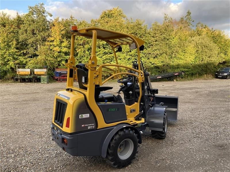 Eurotrac W11 med lang arm, skovl og gafler - لودر مفصلي صغير: صورة 3 Eurotrac W11 med lang arm, skovl og gafler - لودر مفصلي صغير: صورة 3