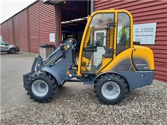 Eurotrac W12S med førerhus, skovl og gafler - اللودر بعجل: صورة 1 Eurotrac W12S med førerhus, skovl og gafler - اللودر بعجل: صورة 1