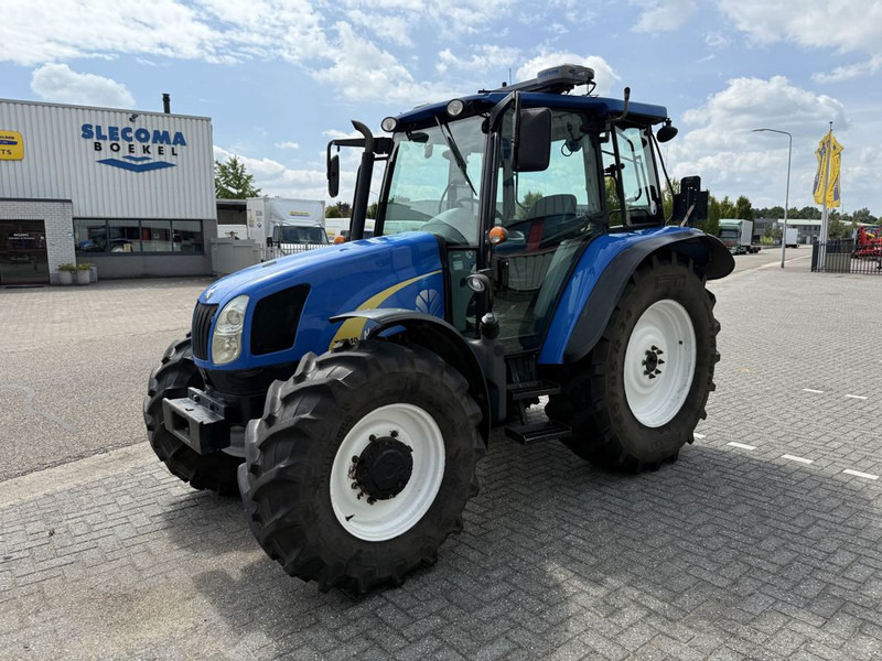 New Holland T5040 CAB + GPS - جرار: صورة 1 New Holland T5040 CAB + GPS - جرار: صورة 1