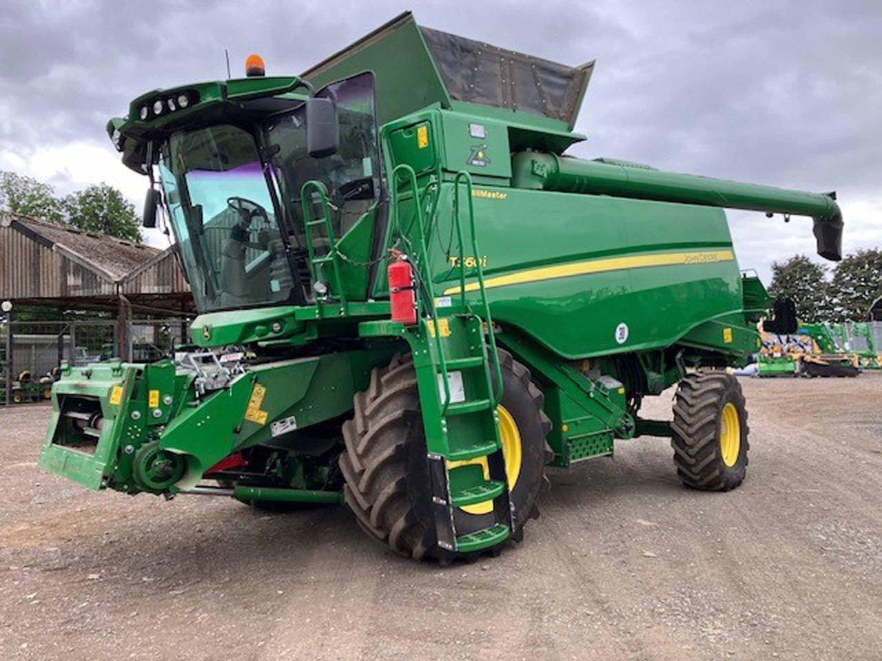 John Deere T560i HillMaster - حصادة موحَّدة: صورة 1 John Deere T560i HillMaster - حصادة موحَّدة: صورة 1