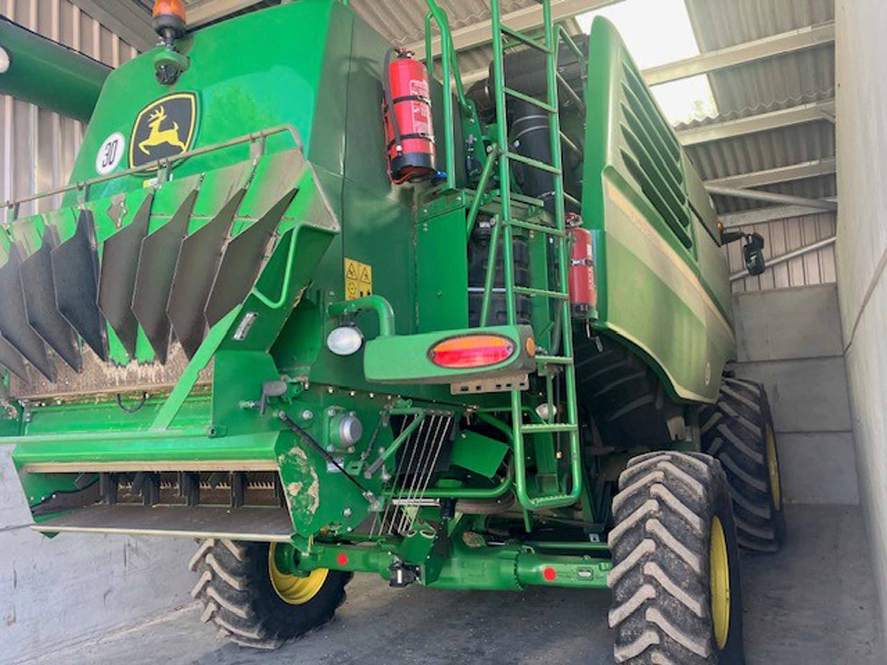 John Deere T560i HillMaster - حصادة موحَّدة: صورة 1 John Deere T560i HillMaster - حصادة موحَّدة: صورة 1