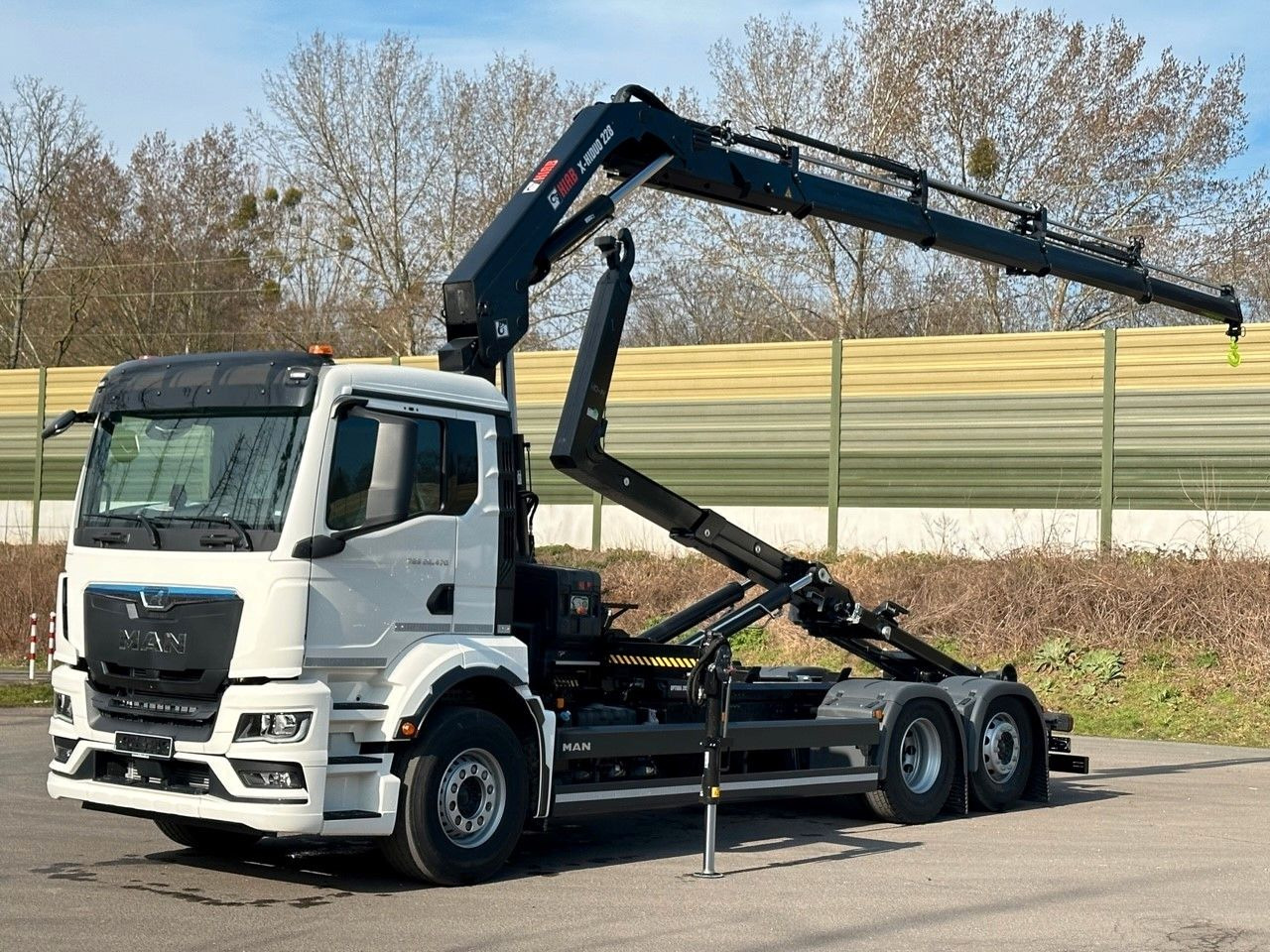 MAN TGS 26.470 6x2 Abrollkipper + Kran Hiab 228-4 - شاحنة ذات خطاف, شاحنة كرين: صورة 1 MAN TGS 26.470 6x2 Abrollkipper + Kran Hiab 228-4 - شاحنة ذات خطاف, شاحنة كرين: صورة 1